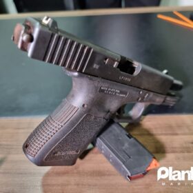 Fotos de Pistola utilizada para matar mulher na frente da filha de 6 anos em Sarandi é apreendida pela PC