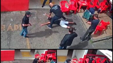 Fotos de Câmera registra momento em que homem é preso com pistola em posto de combustível em Maringá