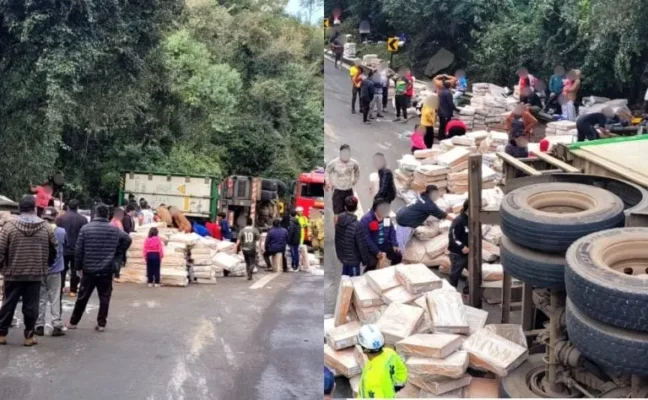 Motorista fica em estado grave após caminhão tombar na BR-277; grupo de 80 pessoas saqueou carga de frango Foto 1 Fotos de Motorista fica em estado grave após caminhão tombar na BR-277; grupo de 80 pessoas saqueou carga de frango